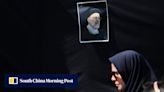 Divided Iran marks Raisi’s death with muted mourning, furtive celebration