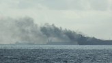 Two large oil tankers collide and catch fire near Singapore