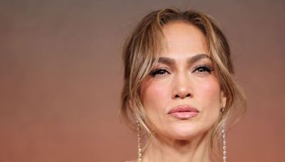 Jennifer Lopez oozes Y2K vibes in all-white outfit and chunky brown belt