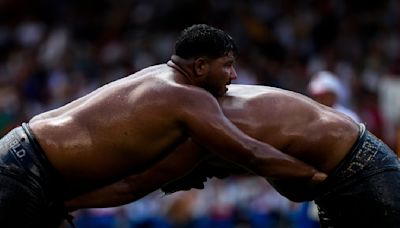 AP PHOTOS: Oil wrestlers battle for the title in a more than 600-year-old competition in Turkey