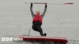 Going, going, gone: Ed Davey takes a dip in Lake Windermere