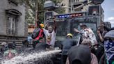 Pictures show police clashing with anti-tax protesters in Kenya's capital