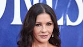 Catherine Zeta-Jones Wore a Super-Deep Plunging Bathing Suit With the Most Practical Accessory