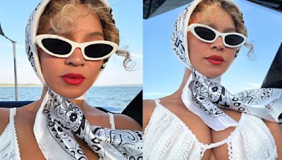 Beyonce brings retro flair to her vacation with white lace skater dress paired with scarf and cat eye sunglasses