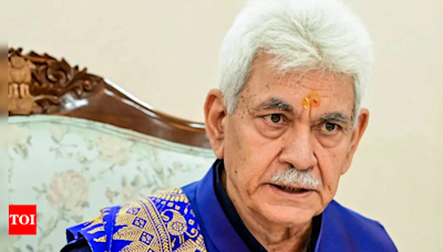 J&K LG Manoj Sinha dismisses four government officials over terror links | India News - Times of India