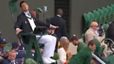 Wimbledon umpire buckles and flails around after chair was dragged off the court