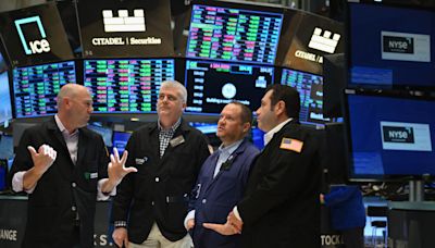 Stock market today: US stocks hold near records as Powell buoys rate-cut hopes