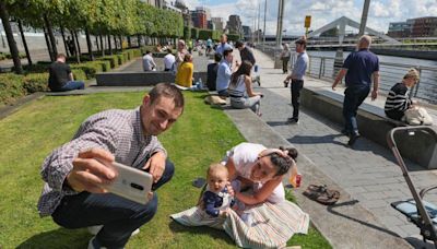 Can you spot yourself? Glaswegians pictured enjoying sunshine at Clyde side