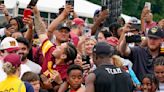 Fans return to Washington Commanders camp to celebrate the team's ownership change