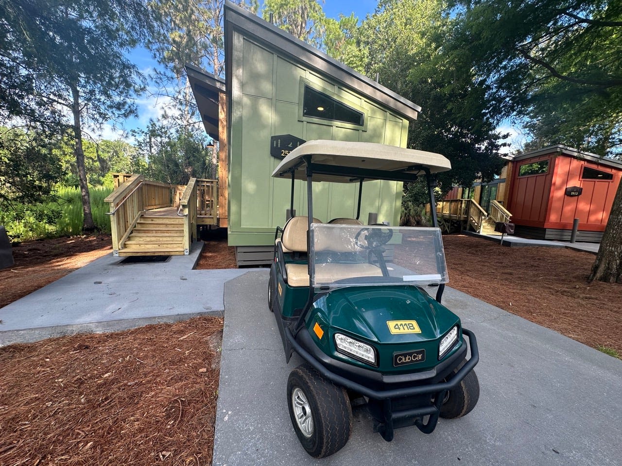 I visited Disney World's high-end campsite. Each one-bedroom cabin sleeps up to 6 adults, and golf carts are everywhere.