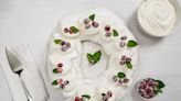 A Pavlova wreath with sugared cranberries will wow guests (and it's gluten free!)