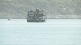 Why is a house floating across the San Francisco Bay?