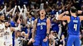 Paolo Banchero of the Orlando Magic celebrates with Jalen Suggs after a basket in the fourth quarter of the Magic's victory