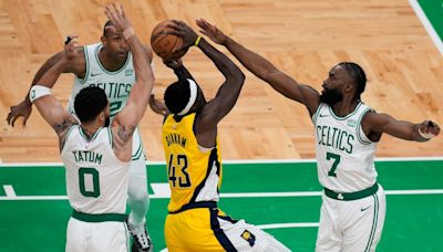 Tatum scores 36, Brown hits 3 to force OT and Celtics edge Pacers 133-128 in Game 1 of East finals