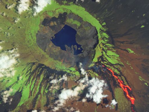 Earth from space: Lava bleeds down iguana-infested volcano as it spits out toxic gas