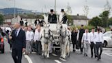 Funeral of three siblings who died in attack in home takes place