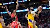 LeBron James and the Lakers secure a playoff berth with 110-106 win over the Pelicans