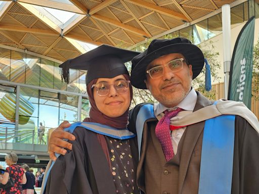 Father and daughter graduate together from the same university