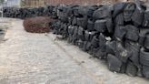 'Dangerous' pile of dumped tyres forces footpath walkers onto 'more hazardous' route