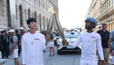 Watch: Fans Cheer As BTS' Jin Kicks Off 2024 Paris Olympics Torch Relay - News18