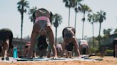 Yoga instructors seek legal action over city ban on their beachside classes