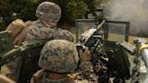 SOCOM is seeking a lightweight machine gun with heavy firepower and a longer range to bridge the gap between the M2 and M240
