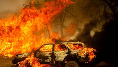 Burning car pushed into a gully blamed for California wildfire — PHOTOS