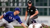 Rangers vencen 4-3 a Astros gracias a mal lanzamiento