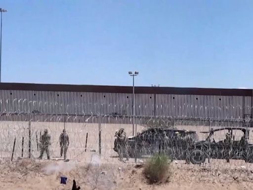 Watch: Guards at US-Mexico border pepper-spray migrants