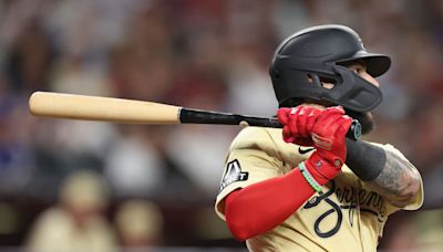 Diamondbacks catcher Jose Herrera exits after taking bat to helmet