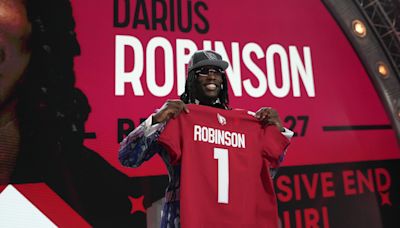 The story of new Cardinals DL Darius Robinson and his ‘anaconda arms’