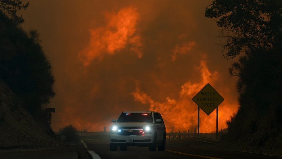 Wildfire east of LA threatens thousands of homes, forces evacuations