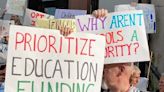 Mayor’s budget boosts schools 8.5%: Advocates protest coming job cuts as spending falls short of demands