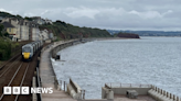 Woman on mobility scooter dies after falling from Devon sea wall