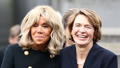 France's First Lady shares a joke at wreath laying ceremony