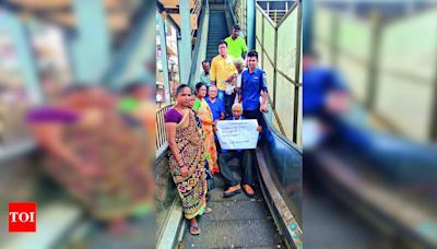 Residents protest non-functional escalator at MEPZ footover bridge | Chennai News - Times of India