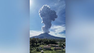 Images show spectacle of Indonesian volcano eruption as authorities evacuate 7 nearby villages