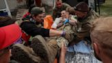 Thousands flee as Russian soldiers ‘walk in’ to Ukrainian village