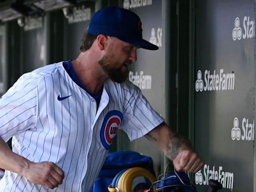 Pitcher suffers broken hand after punching dugout