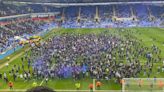 Pitch invasion, sit-in protest and tennis balls cause Reading game to be abandoned