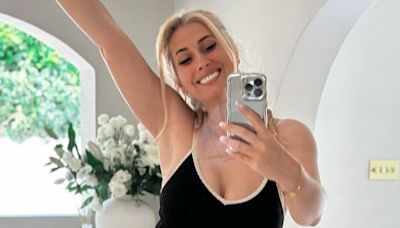 Stacey Solomon slips into a plunging black swimsuit for a pool day