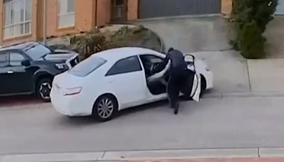 Wild moment Uber Eats driver is allegedly carjacked and bashed