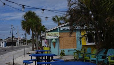 The Latest: Tornado watches in effect as Category 4 storm approaches Florida