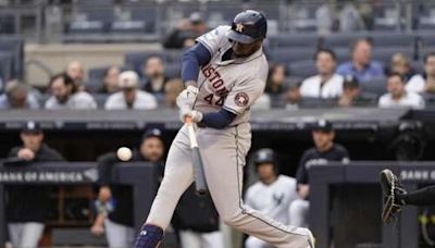 Alvarez, Singleton hit long homers in the first to help Astros avoid being swept by Yanks