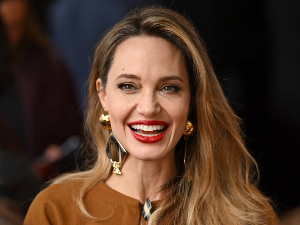 Angelina Jolie's Rarely-Seen Son Knox Makes an Appearance With His Mom & Holy Smokes Is He Grown Up