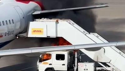 British Airways plane stairs catch fire at Heathrow