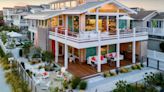 $10.795M Creamsicle Summer House Brings Retro Palm Springs To Seven Mile Island
