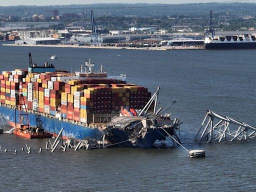 Container ship that caused Baltimore bridge collapse to be refloated, moved out of channel