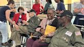 WW2 Veterans receive heroes welcome home following trip to Normandy