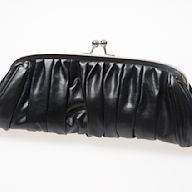A small, handheld bag without straps. Often used for formal occasions or a night out. Comes in various shapes and materials, from simple leather designs to embellished styles with sequins or beading.